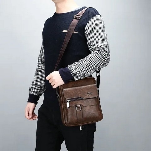 Classic Men's Leather Bag Business Shoulder Bag Leather Messenger Bag Casual Bag. Capacity: Can put in iPad Mini, wallet, mobile phone, portable power supply, folding umbrella, car keys, etc