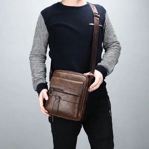 Classic Men's Leather Bag Business Shoulder Bag Leather Messenger Bag Casual Bag. Capacity: Can put in iPad Mini, wallet, mobile phone, portable power supply, folding umbrella, car keys, etc
