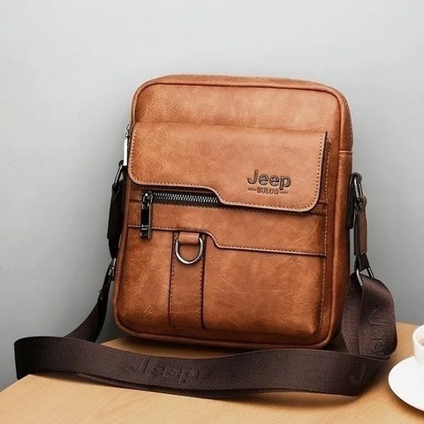 Classic Men's Leather Bag Business Shoulder Bag Leather Messenger Bag Casual Bag. Capacity: Can put in iPad Mini, wallet, mobile phone, portable power supply, folding umbrella, car keys, etc