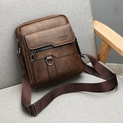 Classic Men's Leather Bag Business Shoulder Bag Leather Messenger Bag Casual Bag. Capacity: Can put in iPad Mini, wallet, mobile phone, portable power supply, folding umbrella, car keys, etc